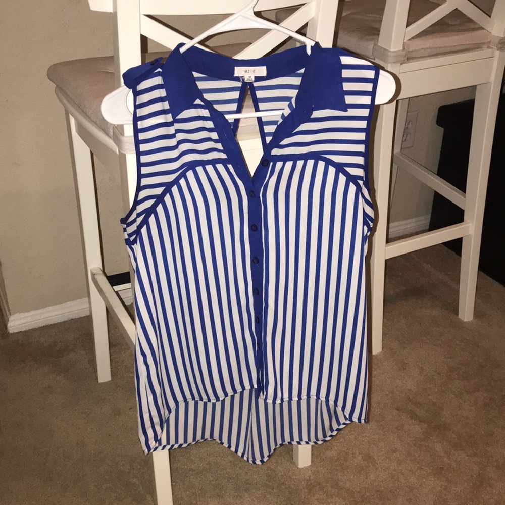 Collared, button down, sleeveless blouse